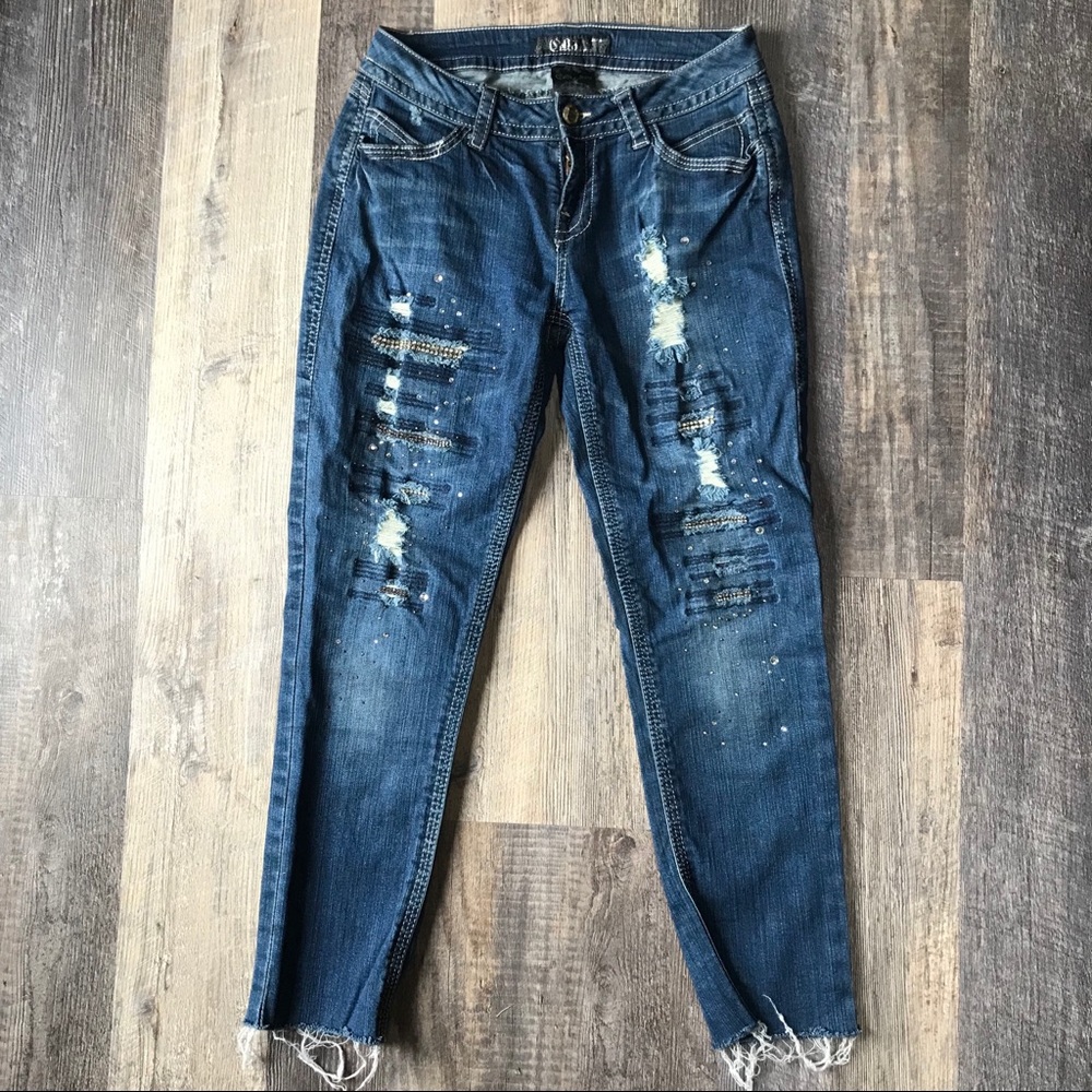 Distressed gem jeans